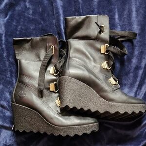 Timberland Black Wedge Boots with Gold Accents